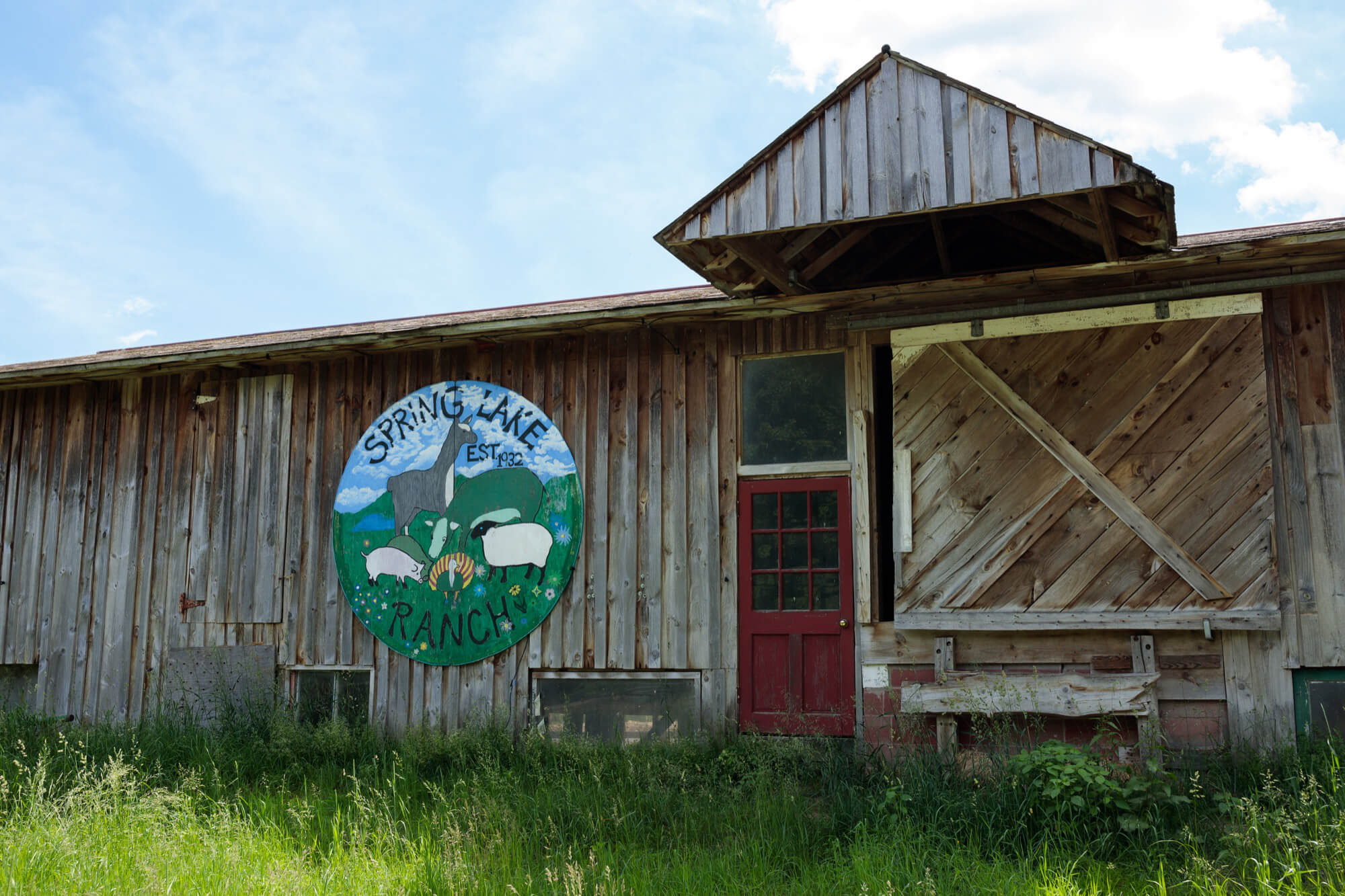wood building with spring lake ranch sign