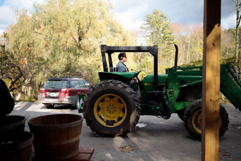 man in green tractor